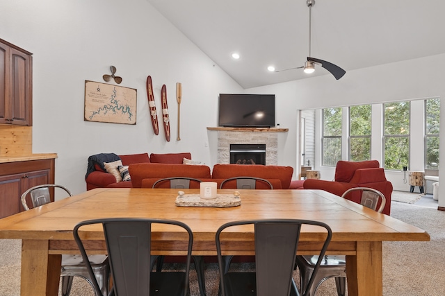 235 Lower Emerald Bay Cir Unit C-6, Hollister, MO 65672 - dining space featuring a fireplace, a ceiling fan, carpet flooring, lofted ceiling, and recessed lighting