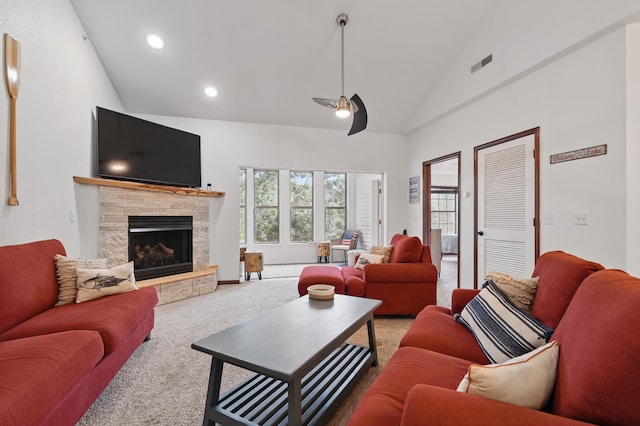 235 Lower Emerald Bay Cir Unit C-6, Hollister, MO 65672 - carpeted living area featuring high vaulted ceiling, a stone fireplace, recessed lighting, and a ceiling fan