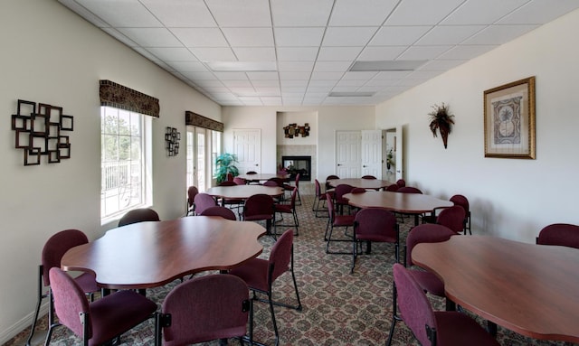 235 Lower Emerald Bay Cir Unit C-6, Hollister, MO 65672 - dining space featuring a drop ceiling and carpet