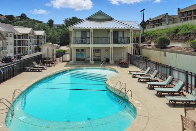 235 Lower Emerald Bay Cir Unit C-6, Hollister, MO 65672 - community pool featuring a patio area