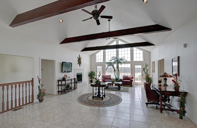 235 Lower Emerald Bay Cir Unit C-6, Hollister, MO 65672 - living area with high vaulted ceiling, a ceiling fan, beam ceiling, tile patterned flooring, and a fireplace with raised hearth