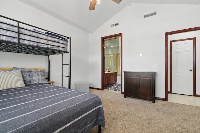 235 Lower Emerald Bay Cir Unit C-6, Hollister, MO 65672 - carpeted bedroom with baseboards, ensuite bathroom, ceiling fan, and high vaulted ceiling