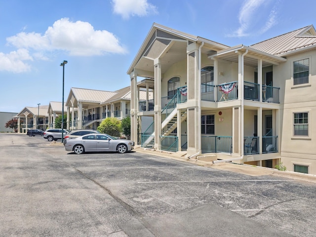235 Lower Emerald Bay Cir Unit C-6, Hollister, MO 65672 - view of property featuring uncovered parking