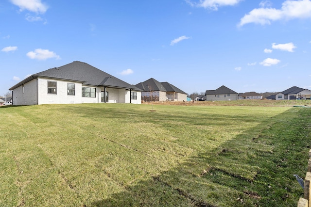 2048 N Sun Valley Dr, Springfield, MO 65802 - view of grassy yard with a residential view
