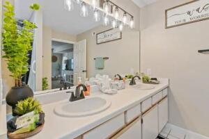 151 Highland Dr Unit 3, Branson, MO 65616 - bathroom featuring double vanity and tile patterned flooring
