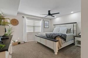 151 Highland Dr Unit 3, Branson, MO 65616 - bedroom with carpet flooring, a ceiling fan, recessed lighting, and baseboards