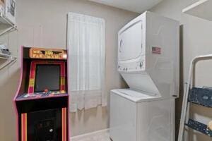151 Highland Dr Unit 3, Branson, MO 65616 - washroom with stacked washer and clothes dryer