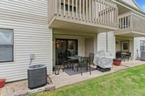 151 Highland Dr Unit 3, Branson, MO 65616 - back of property featuring a balcony, a patio, cooling unit, and outdoor dining area