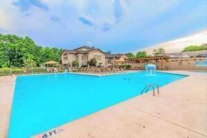 151 Highland Dr Unit 3, Branson, MO 65616 - outdoor pool featuring a patio
