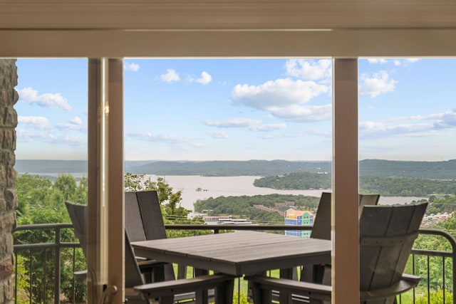 130 Royal Vista Dr Unit 601, Branson, MO 65616 - balcony featuring a water view and outdoor dining space