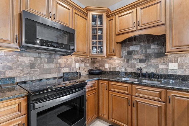 130 Royal Vista Dr Unit 601, Branson, MO 65616 - kitchen featuring stainless steel electric stove, a sink, tasteful backsplash, and dark stone countertops