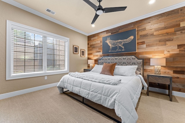 130 Royal Vista Dr Unit 601, Branson, MO 65616 - carpeted bedroom featuring wooden walls, crown molding, baseboards, an accent wall, and ceiling fan