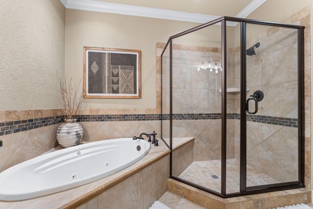 130 Royal Vista Dr Unit 601, Branson, MO 65616 - bathroom with a jetted tub, crown molding, a shower stall, a textured wall, and tile walls