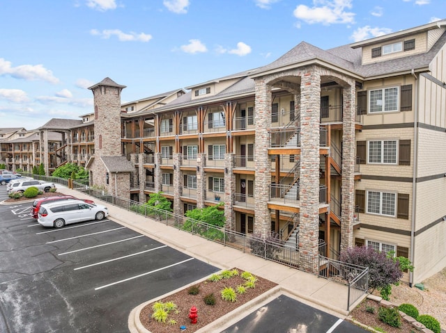 130 Royal Vista Dr Unit 601, Branson, MO 65616 - view of apartment building / complex featuring uncovered parking