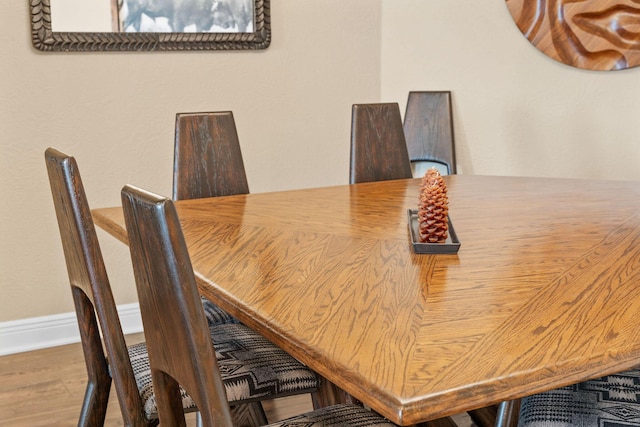 130 Royal Vista Dr Unit 601, Branson, MO 65616 - dining area featuring baseboards and wood finished floors