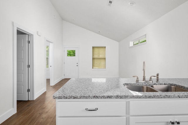 1211 S Pennsylvania Ave, Springfield, MO 65807 - kitchen featuring a sink, dark wood-type flooring, healthy amount of natural light, light stone counters, and high vaulted ceiling