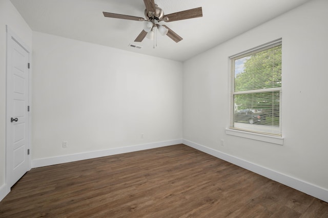 1211 S Pennsylvania Ave, Springfield, MO 65807 - empty room featuring dark wood-style floors, baseboards, and ceiling fan