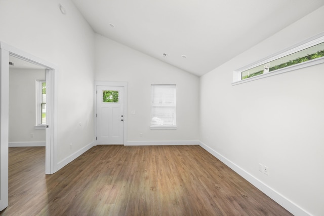 1211 S Pennsylvania Ave, Springfield, MO 65807 - entrance foyer featuring healthy amount of natural light, wood finished floors, baseboards, and high vaulted ceiling