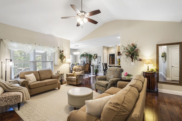 94 W Pine Ln, Reeds Spring, MO 65737 - living room with ceiling fan, dark wood finished floors, vaulted ceiling, and baseboards