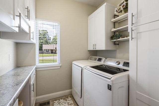 94 W Pine Ln, Reeds Spring, MO 65737 - laundry room with cabinet space, washing machine and clothes dryer, and baseboards