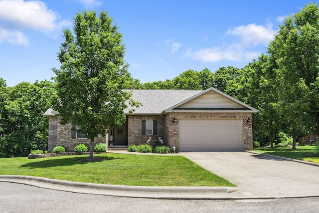 94 W Pine Ln, Reeds Spring, MO 65737 - view of front of home featuring a garage, driveway, brick siding, a front yard, and a shingled roof