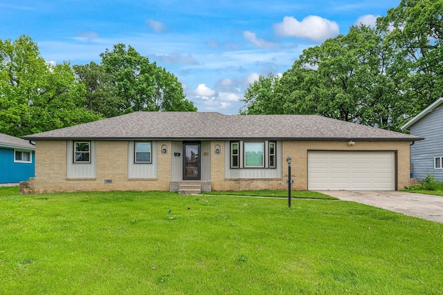 2711 E Stanford St, Springfield, MO 65804 - single story home with brick siding, a garage, driveway, and roof with shingles