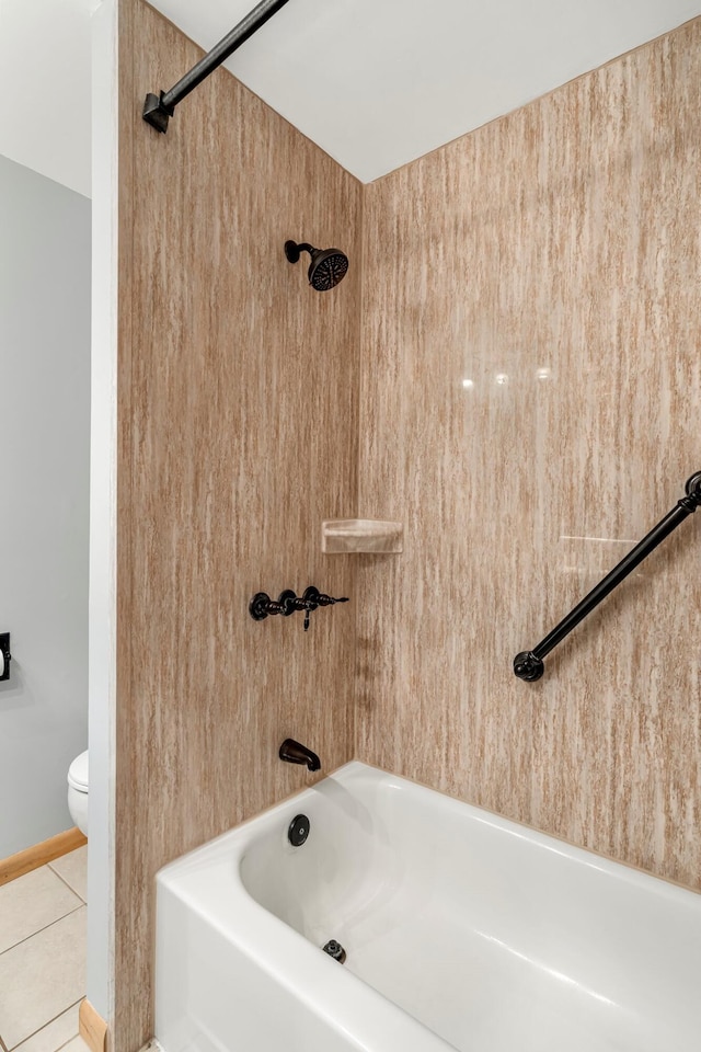 2711 E Stanford St, Springfield, MO 65804 - bathroom featuring toilet, bathing tub / shower combination, and tile patterned flooring