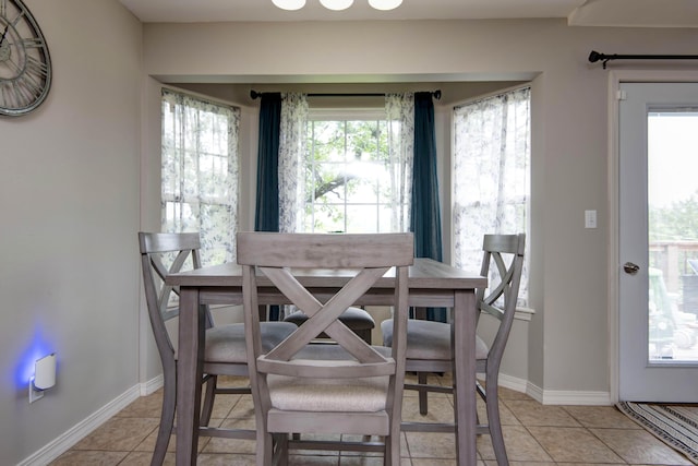 326 Country Bluff Dr, Branson, MO 65616 - dining area featuring light tile patterned flooring and baseboards