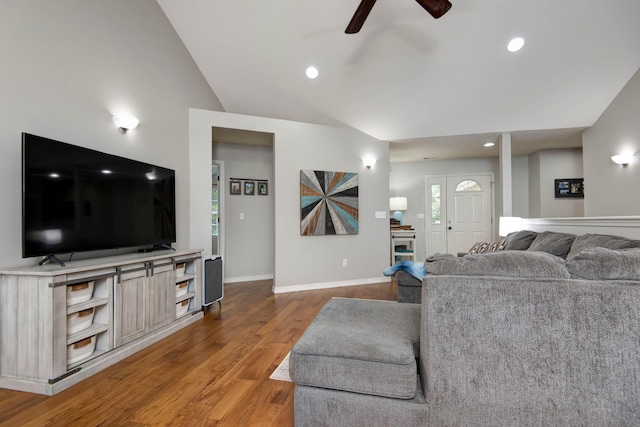 326 Country Bluff Dr, Branson, MO 65616 - living area featuring ceiling fan, light wood-style floors, vaulted ceiling, baseboards, and plenty of natural light