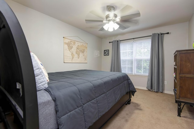 326 Country Bluff Dr, Branson, MO 65616 - bedroom with light carpet, baseboards, a ceiling fan, and arched walkways