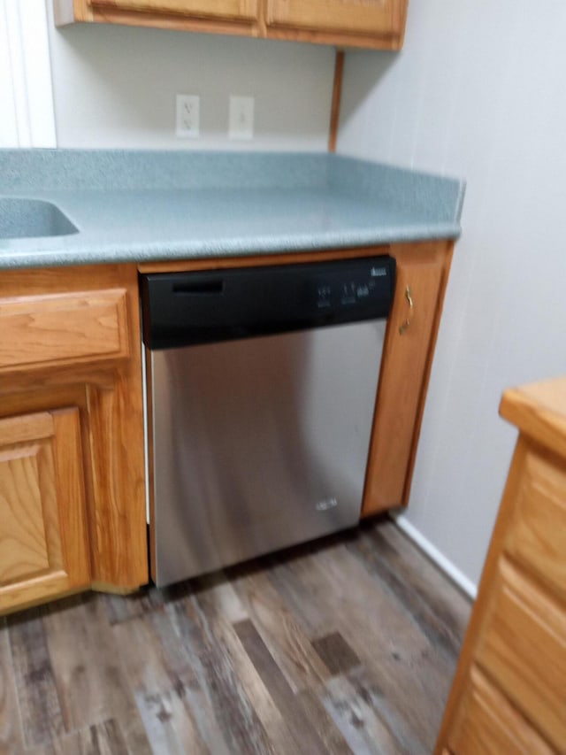 3271 Oak Grove Cir, Flemington, MO 65650 - kitchen view of dishwasher, wood finished floors, and light countertops