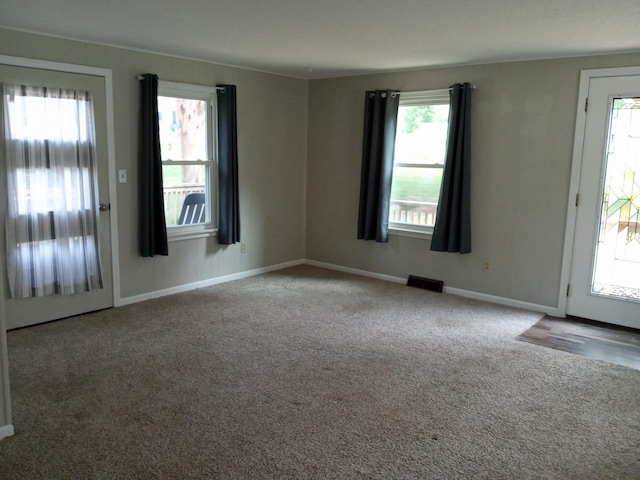3271 Oak Grove Cir, Flemington, MO 65650 - foyer entrance with healthy amount of natural light, carpet, and baseboards