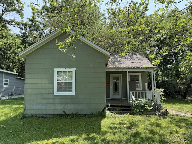 1708 N Clay Ave, Springfield, MO 65803 - view of front of house featuring a front lawn and a porch