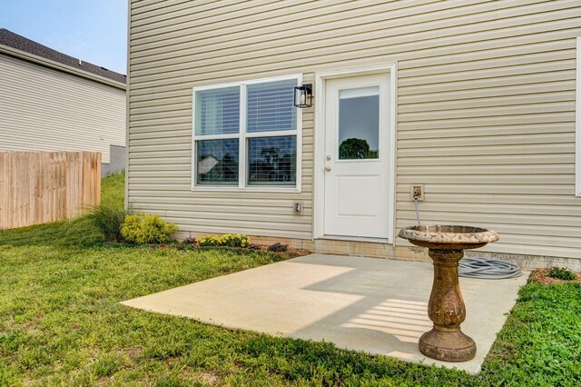 1132 E Lakota St, Nixa, MO 65714 - view of exterior entry featuring a patio