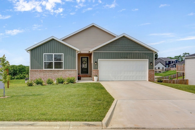 1132 E Lakota St, Nixa, MO 65714 - ranch-style house with board and batten siding, an attached garage, a front lawn, and brick siding