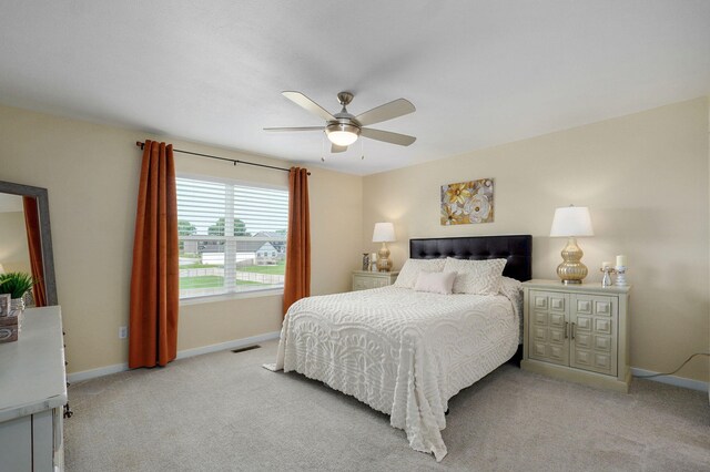1132 E Lakota St, Nixa, MO 65714 - carpeted bedroom featuring baseboards and ceiling fan