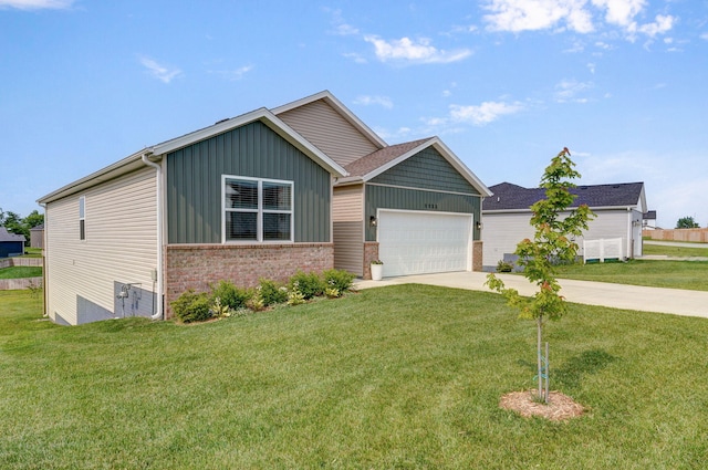 1132 E Lakota St, Nixa, MO 65714 - view of front of property featuring brick siding, a garage, driveway, board and batten siding, and a front yard