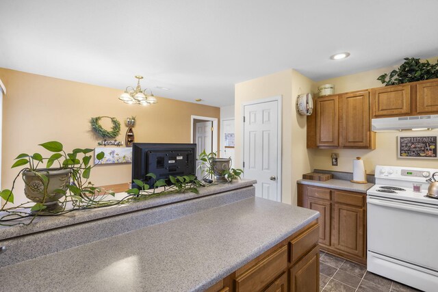 120 Deer Run Rd, Branson, MO 65616 - kitchen featuring white electric range oven, under cabinet range hood, brown cabinetry, a chandelier, and recessed lighting