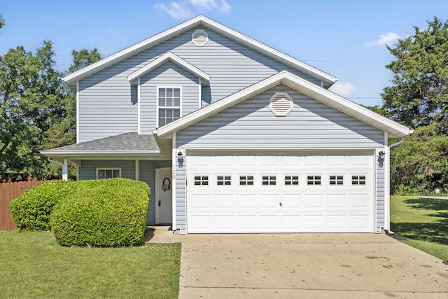 120 Deer Run Rd, Branson, MO 65616 - traditional-style house featuring a front yard, driveway, and an attached garage