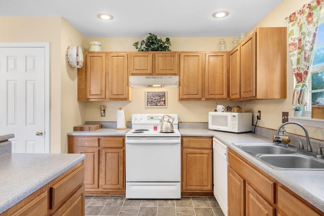 120 Deer Run Rd, Branson, MO 65616 - kitchen with white appliances, a sink, under cabinet range hood, and light countertops