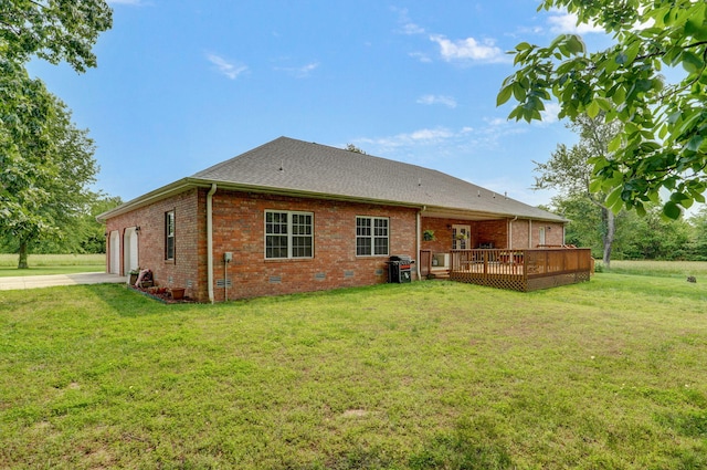 5473 N State Highway 125, Strafford, MO 65757 - rear view of property with a wooden deck, a lawn, brick siding, and crawl space