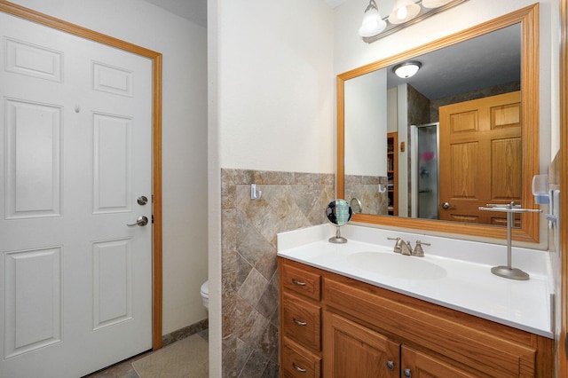 5473 N State Highway 125, Strafford, MO 65757 - full bath featuring vanity, toilet, a shower, and tile patterned floors