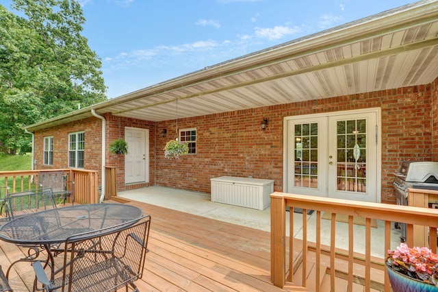 5473 N State Highway 125, Strafford, MO 65757 - wooden deck with french doors, outdoor dining area, and grilling area