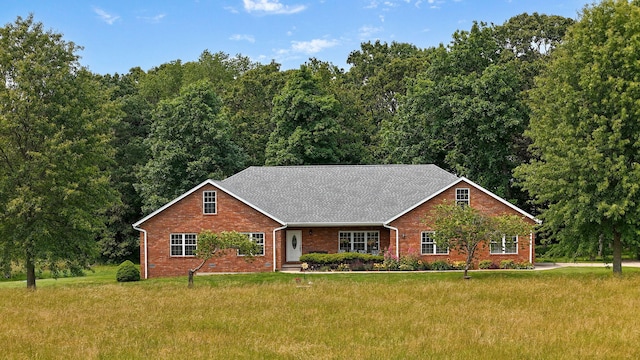 5473 N State Highway 125, Strafford, MO 65757 - view of front facade featuring brick siding, a front yard, roof with shingles, and a wooded view
