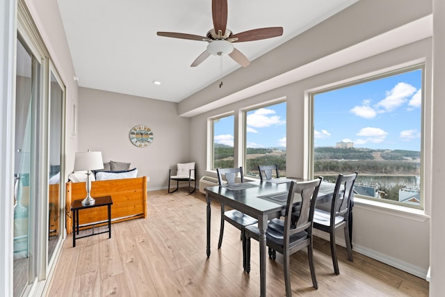 200 Majestic Dr # 423, Branson, MO 65616 - dining area with wood finished floors, baseboards, a ceiling fan, recessed lighting, and a water view