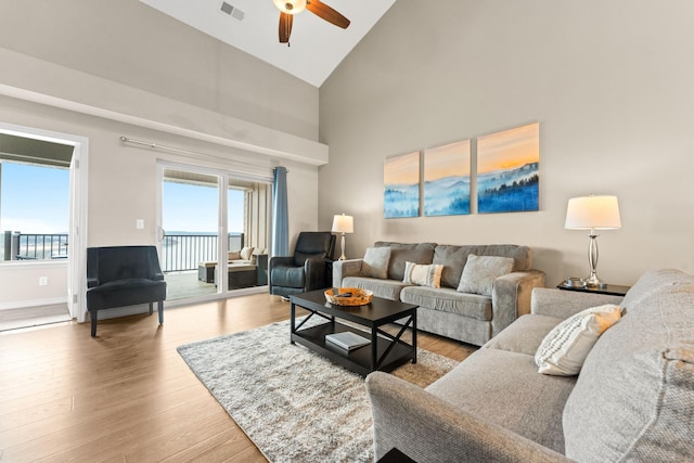 200 Majestic Dr # 423, Branson, MO 65616 - living area with high vaulted ceiling, a ceiling fan, wood finished floors, and baseboards