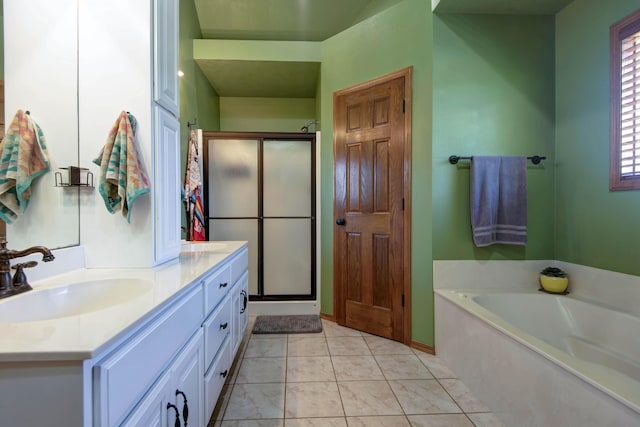 5052 E Cherry Pl, Springfield, MO 65809 - bathroom featuring a shower stall, a garden tub, and vanity