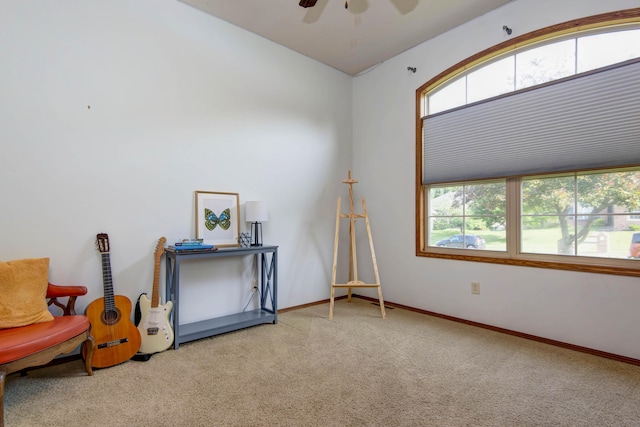 5052 E Cherry Pl, Springfield, MO 65809 - living area featuring carpet, a ceiling fan, and baseboards