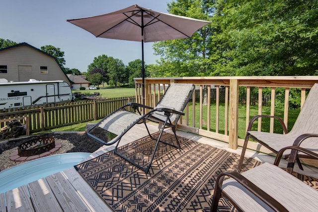 5052 E Cherry Pl, Springfield, MO 65809 - wooden deck with an outdoor fire pit