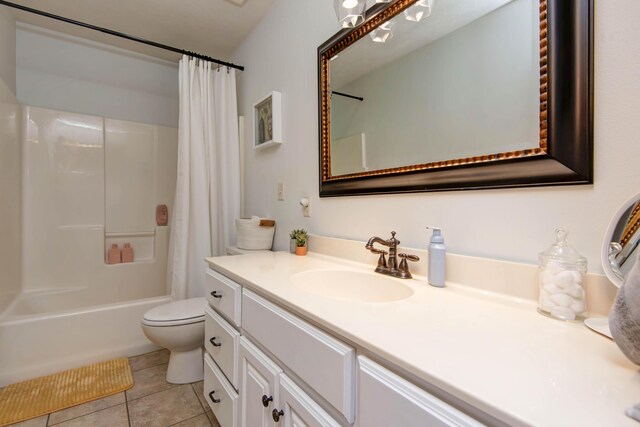 5052 E Cherry Pl, Springfield, MO 65809 - full bath with vanity, tile patterned floors, shower / tub combo, and toilet